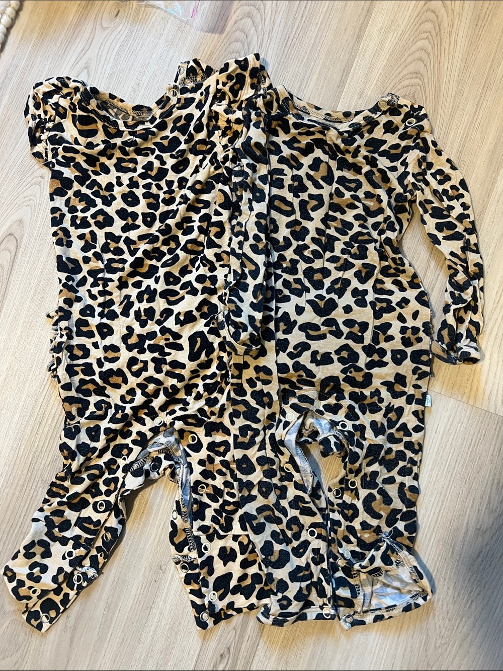 Posh Peanut Lana Leopard Print One-Piece Bodysuits
